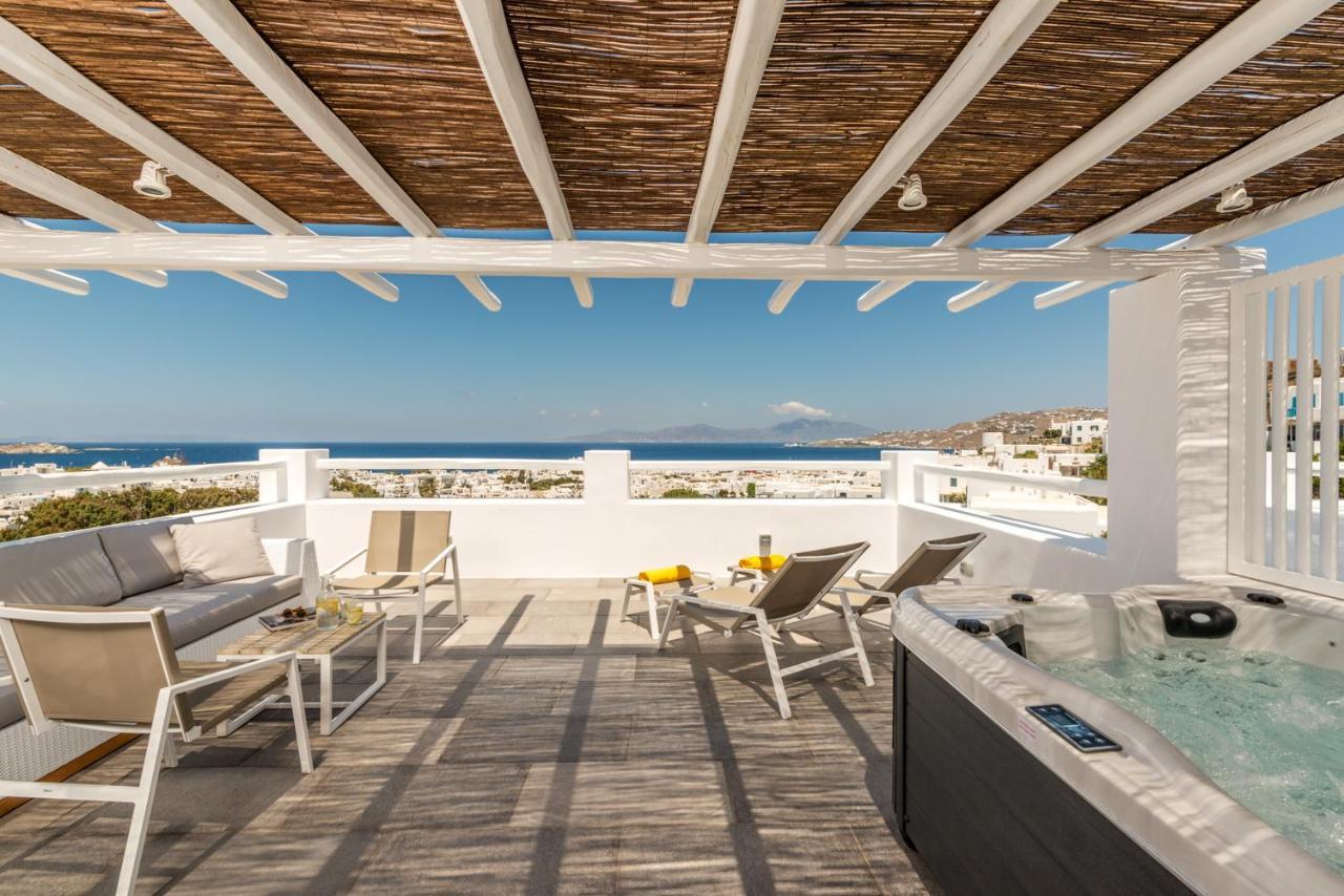 Grande Suite avec Terrasse et Jacuzzi Extérieur - Vue Panoramique sur Mer