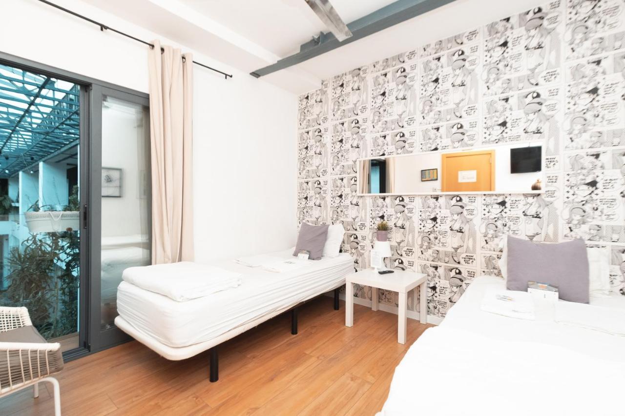 Quarto Twin com Casa de Banho Partilhada
