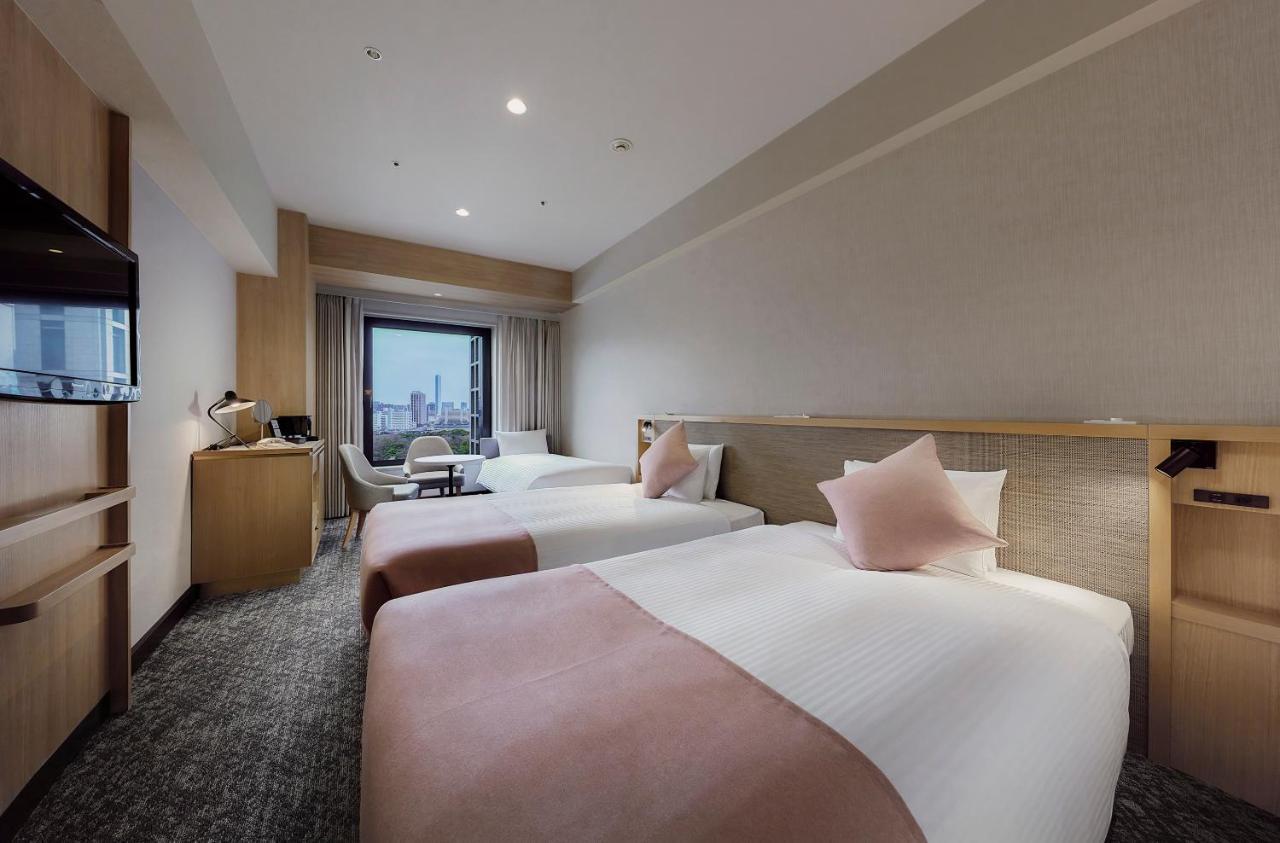 Deluxe Kamer met twee aparte bedden (30 m²) met slaapbank - Voor 3 personen - Rookvrij - Hoge verdieping