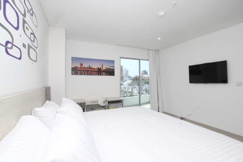 Suite mit Kingsize-Bett und Balkon