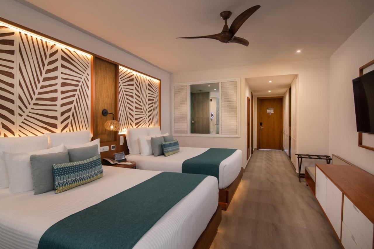 Junior Suite mit Doppelbett und tropischer Aussicht