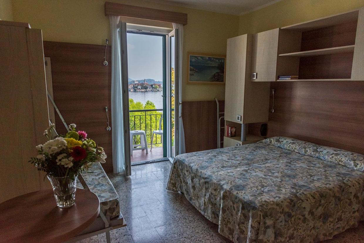 Camera Tripla Standard con Balcone e Vista Lago
