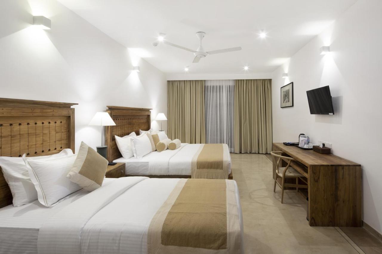 Quarto Triplo Super Deluxe com Vista Mar