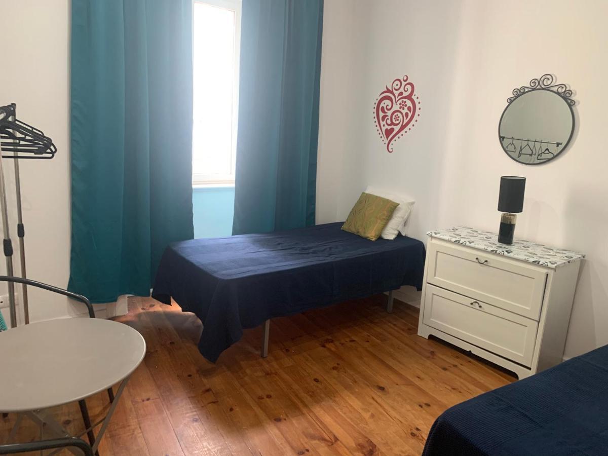 Quarto Duplo ou Twin com Casa de Banho Partilhada