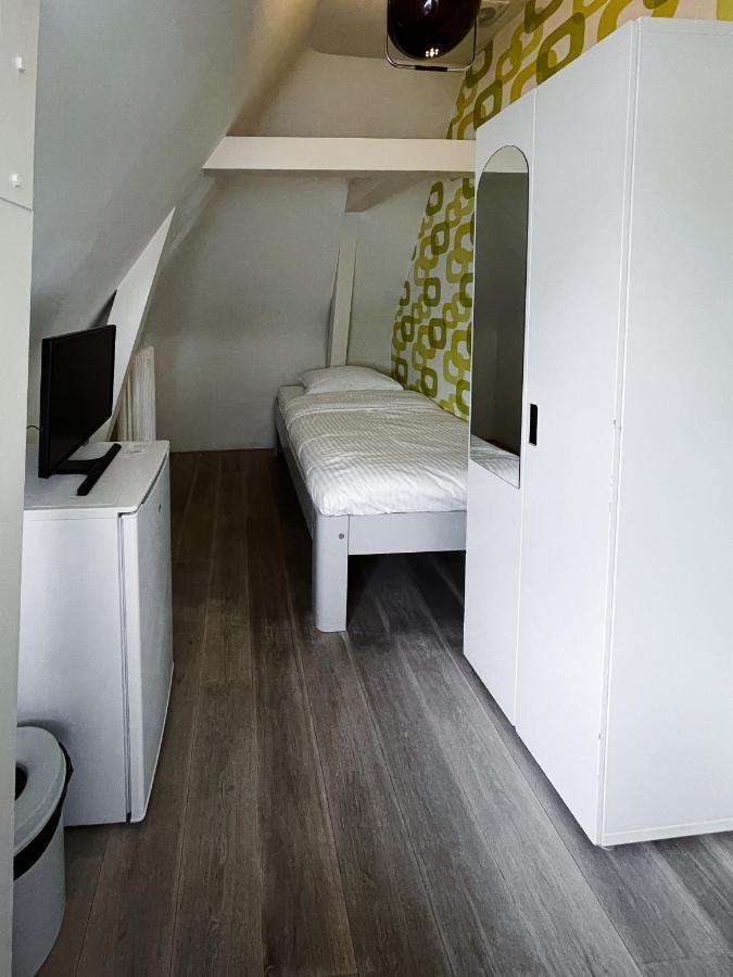 Camera Singola con Bagno in Comune