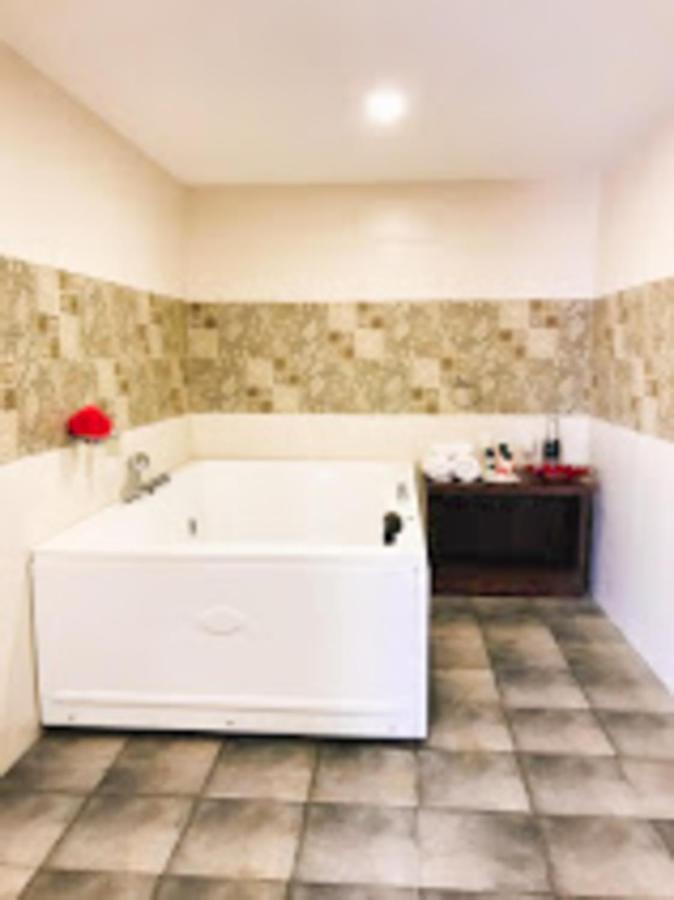 Kamer met Kingsize bed en Bubbelbad