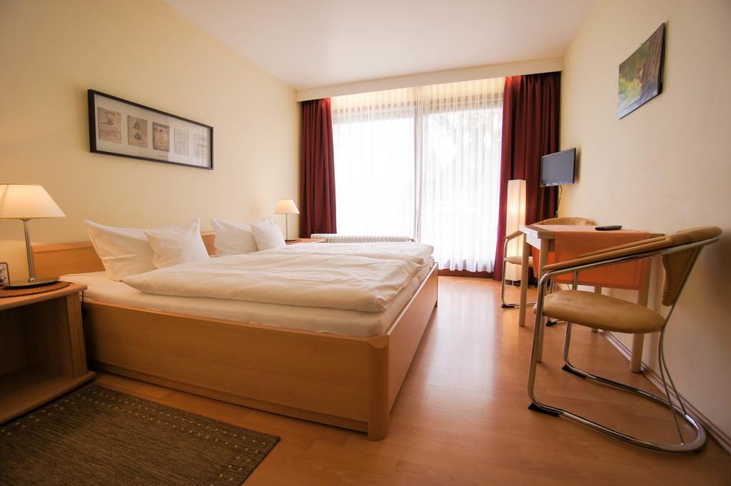 Quarto Standard com Cama de Casal ou 2 de Solteiro