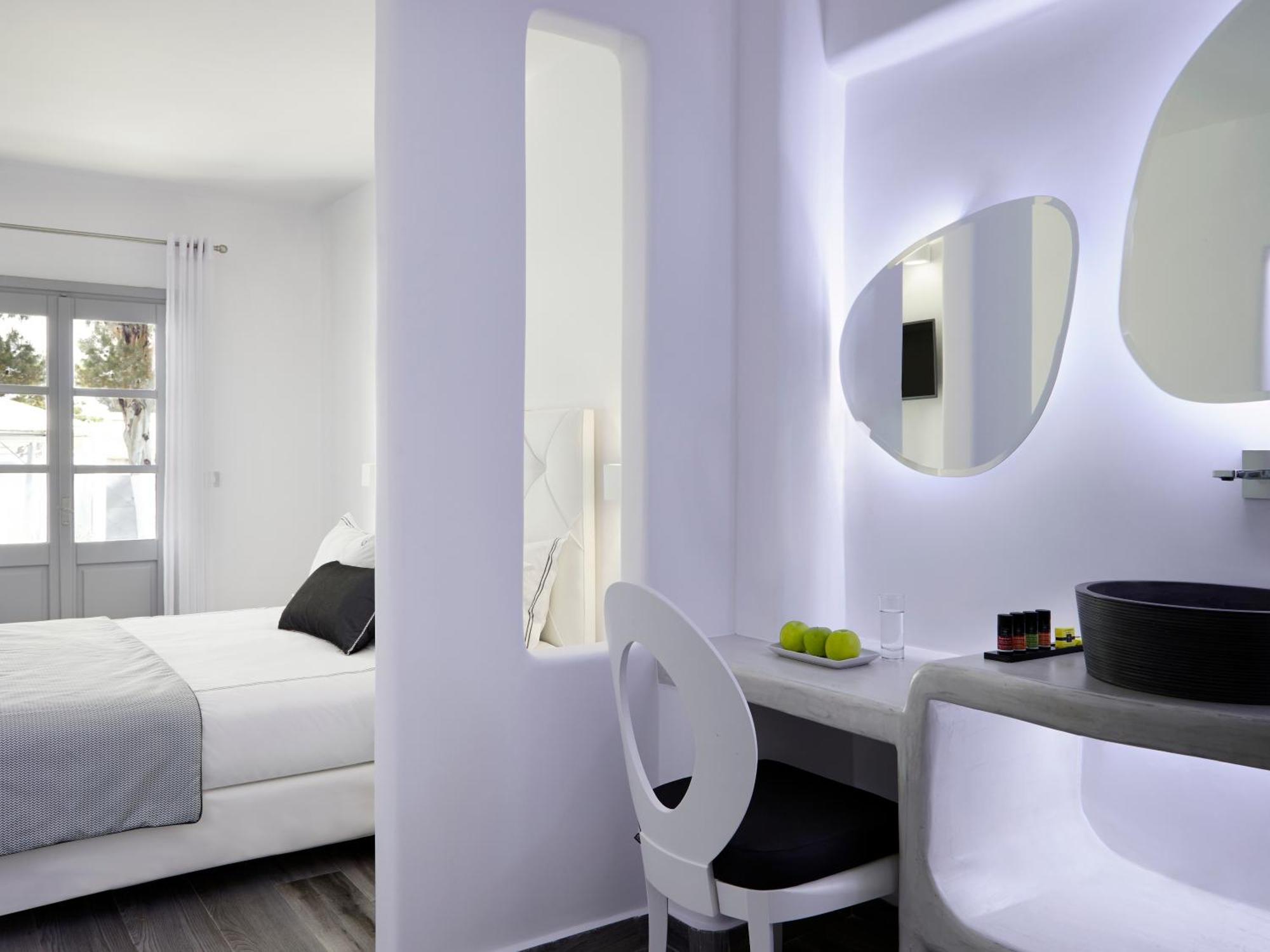 Elegant White Deluxe Room Private Balcony