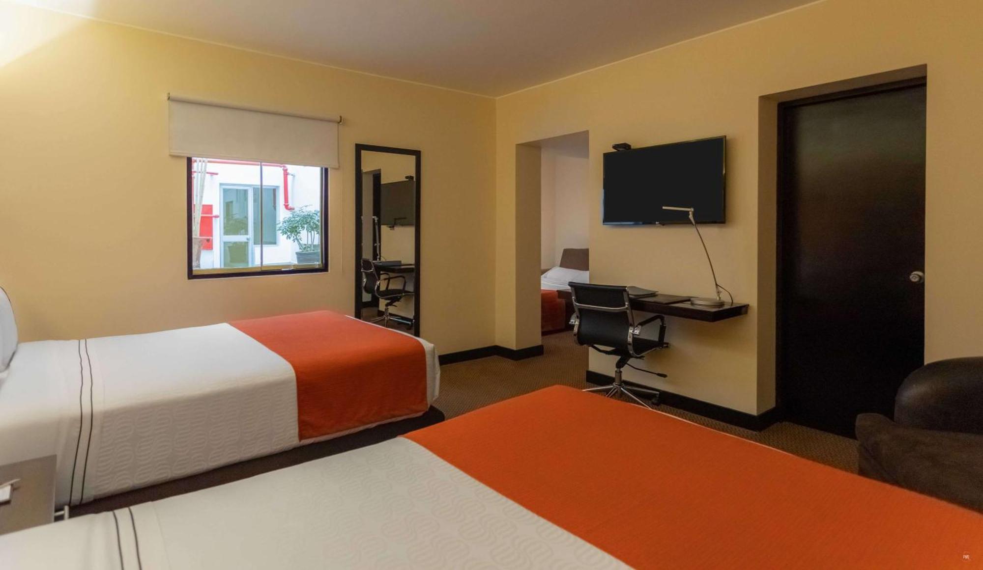 Quarto Twin Standard com 2 Camas de Casal