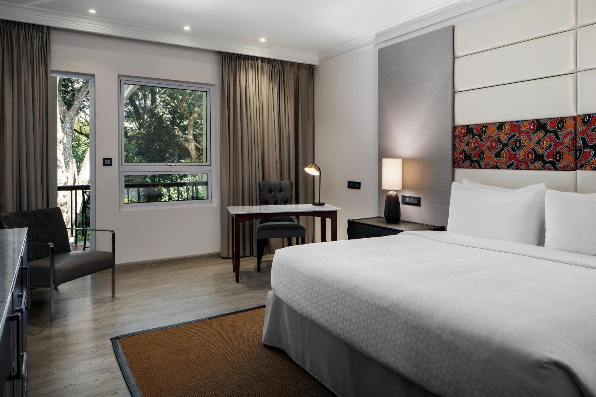 Premium Deluxe King Room with Balcony and Garden View