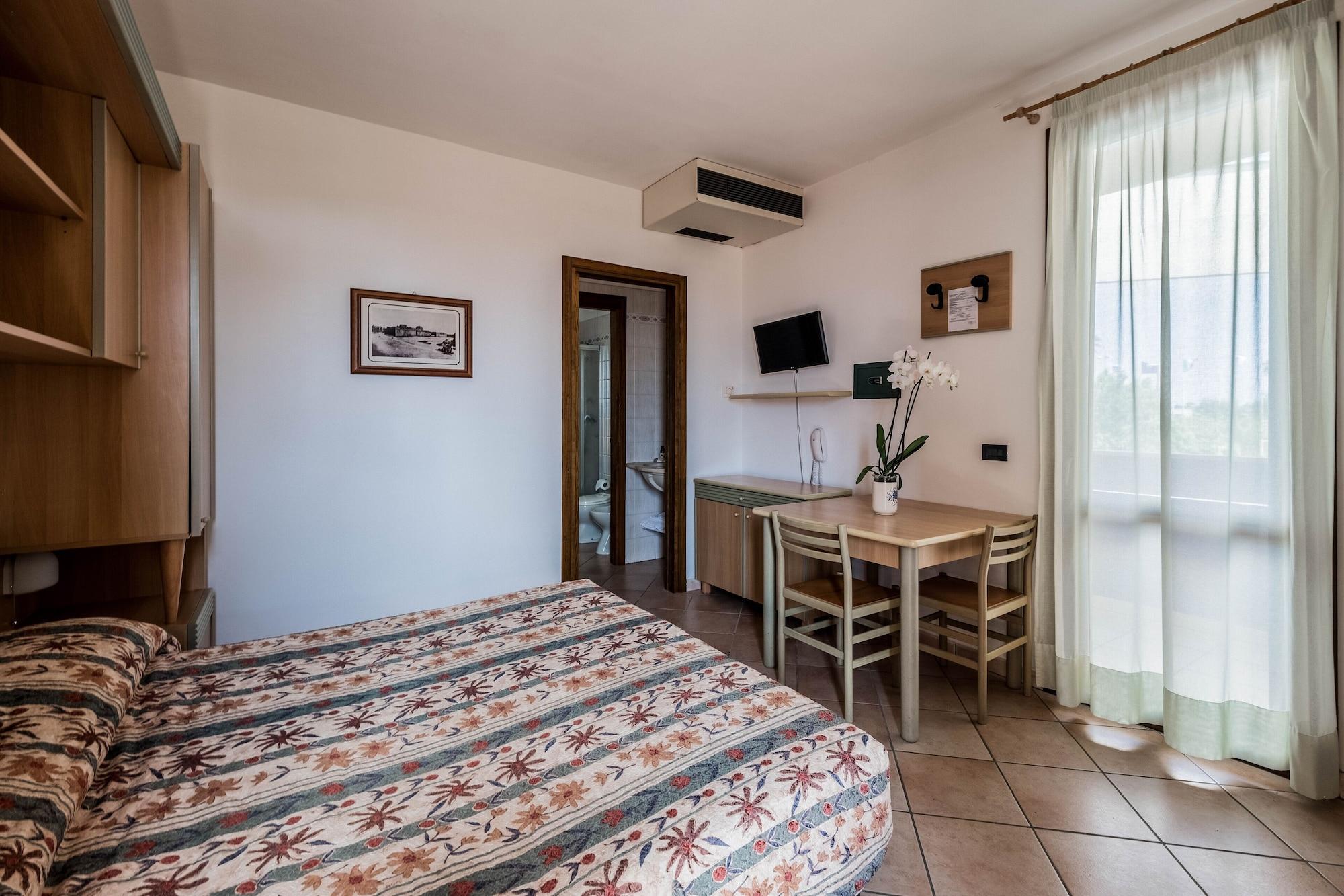Habitación Superior con 1 cama doble y 1 sofá cama