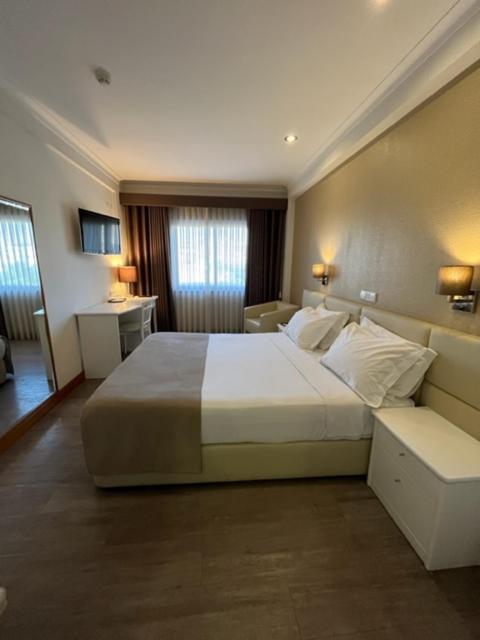 Quarto Duplo com Banheira de Hidromassagem