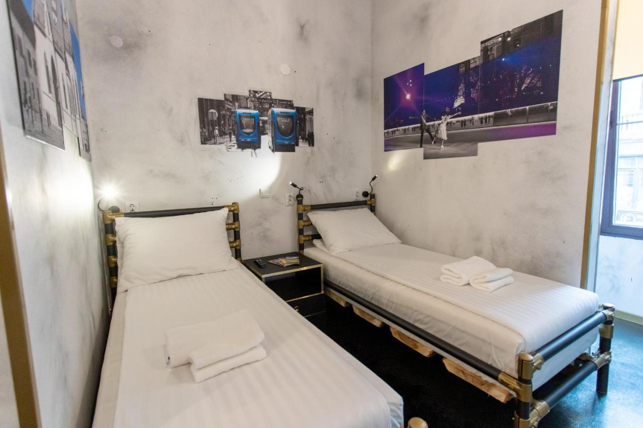 Tweepersoonskamer met 2 Aparte Bedden