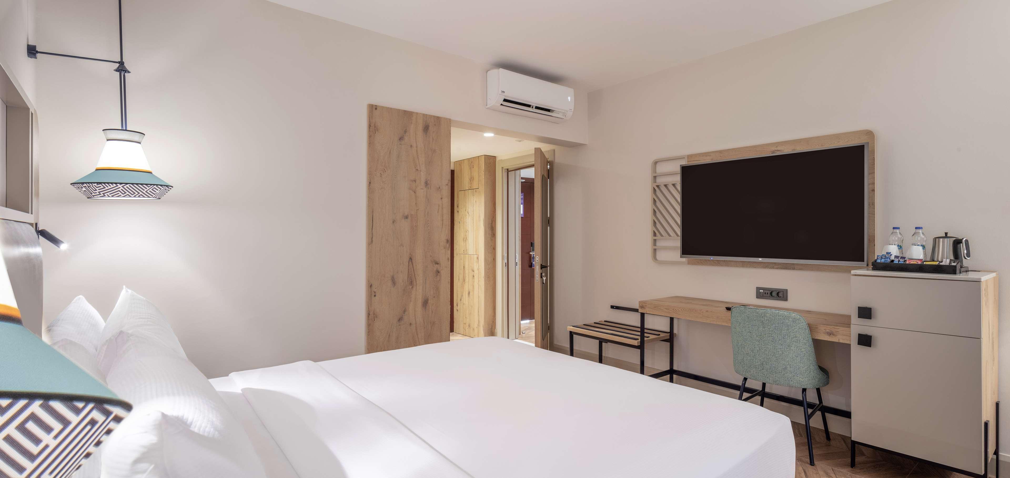 Zimmer mit Kingsize Bett