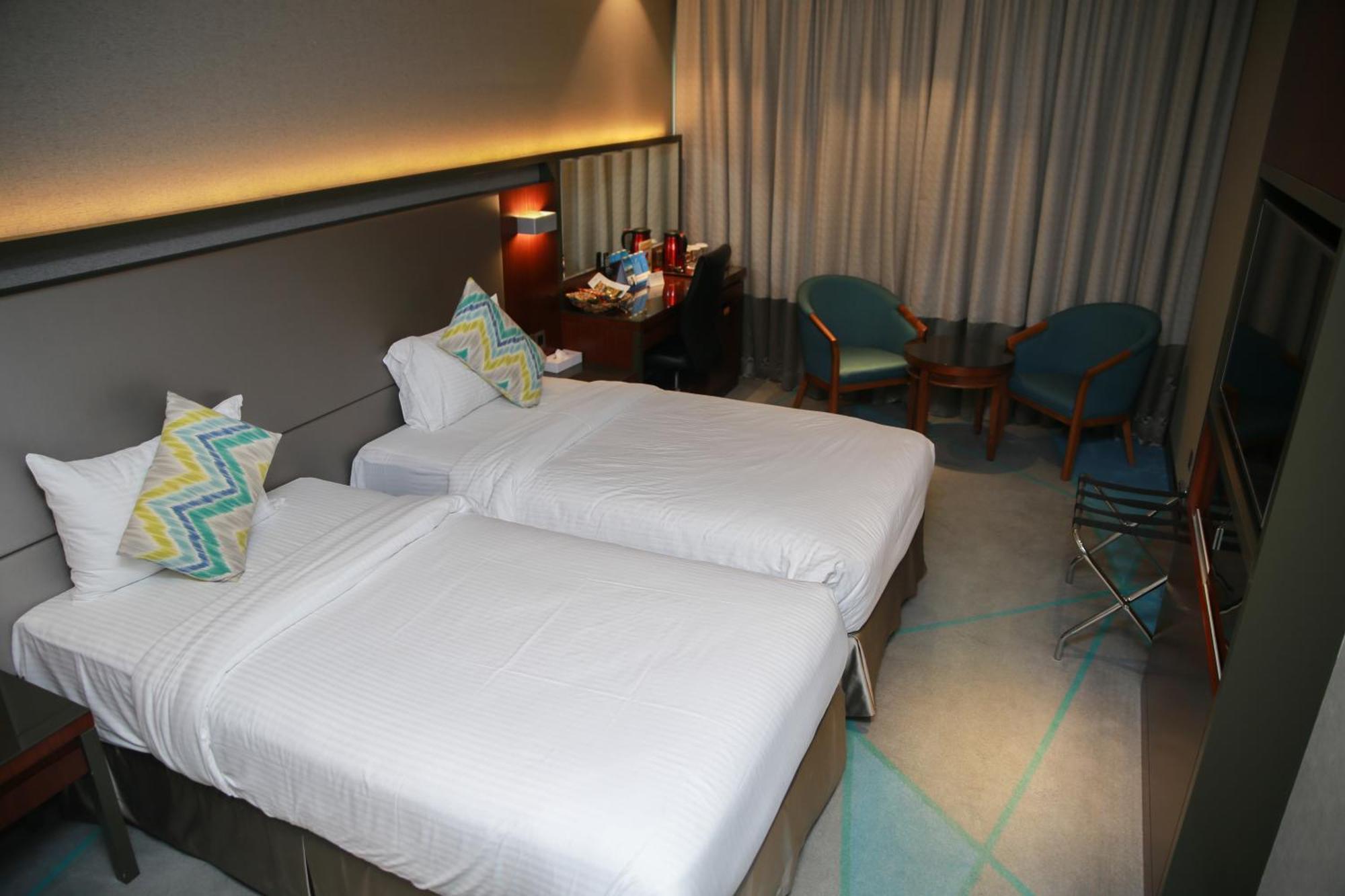 Quarto com 2 Camas de Solteiro
