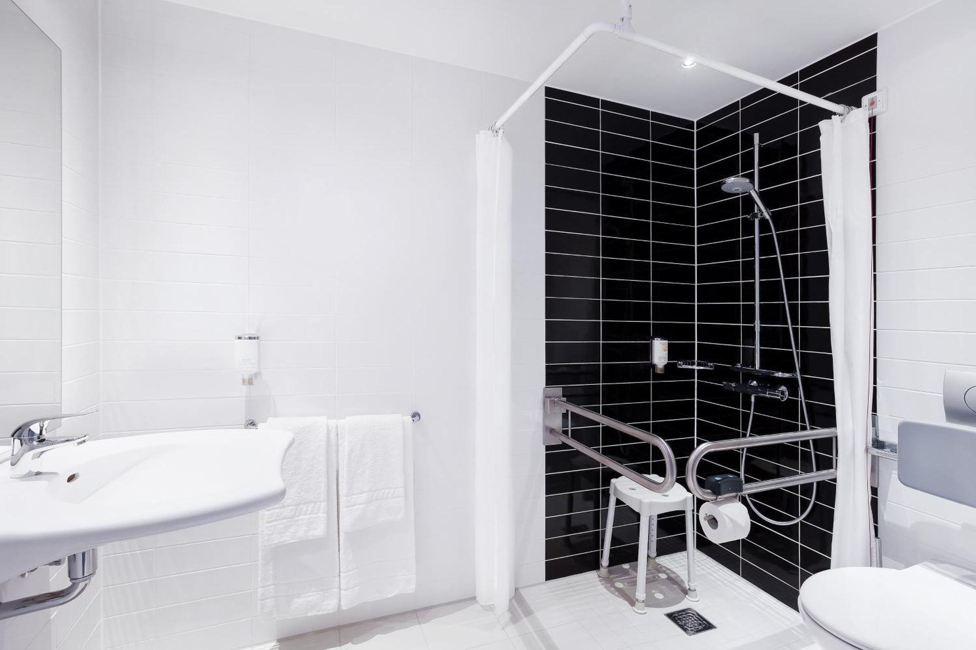 Queen Room Mobility Access Roll Shower or Non-Smoking
