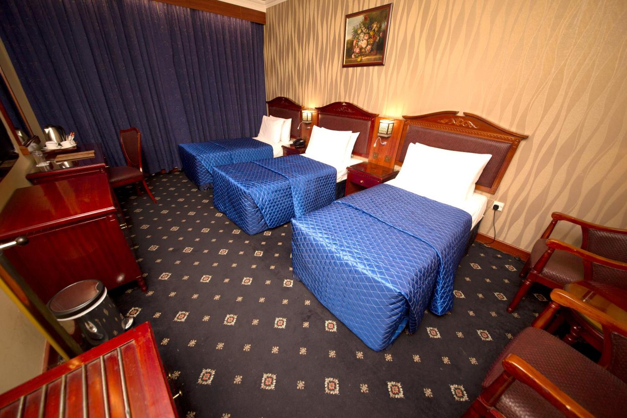 Deluxe Triple Room