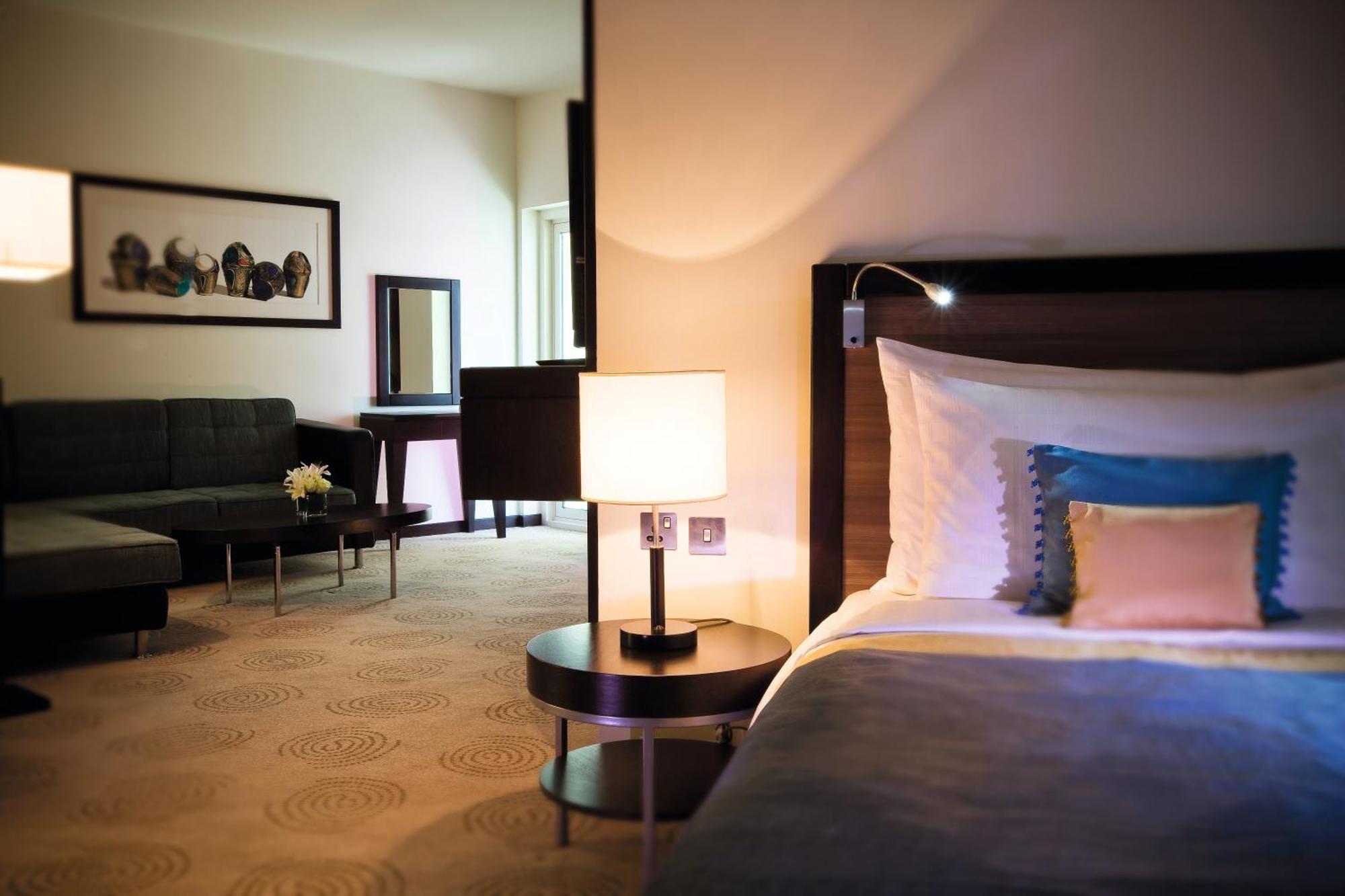 AVANI Executive Suite Living & Dining Area Early Check & Late Check-Out Happy Hours Section Rooftop Pool Access
