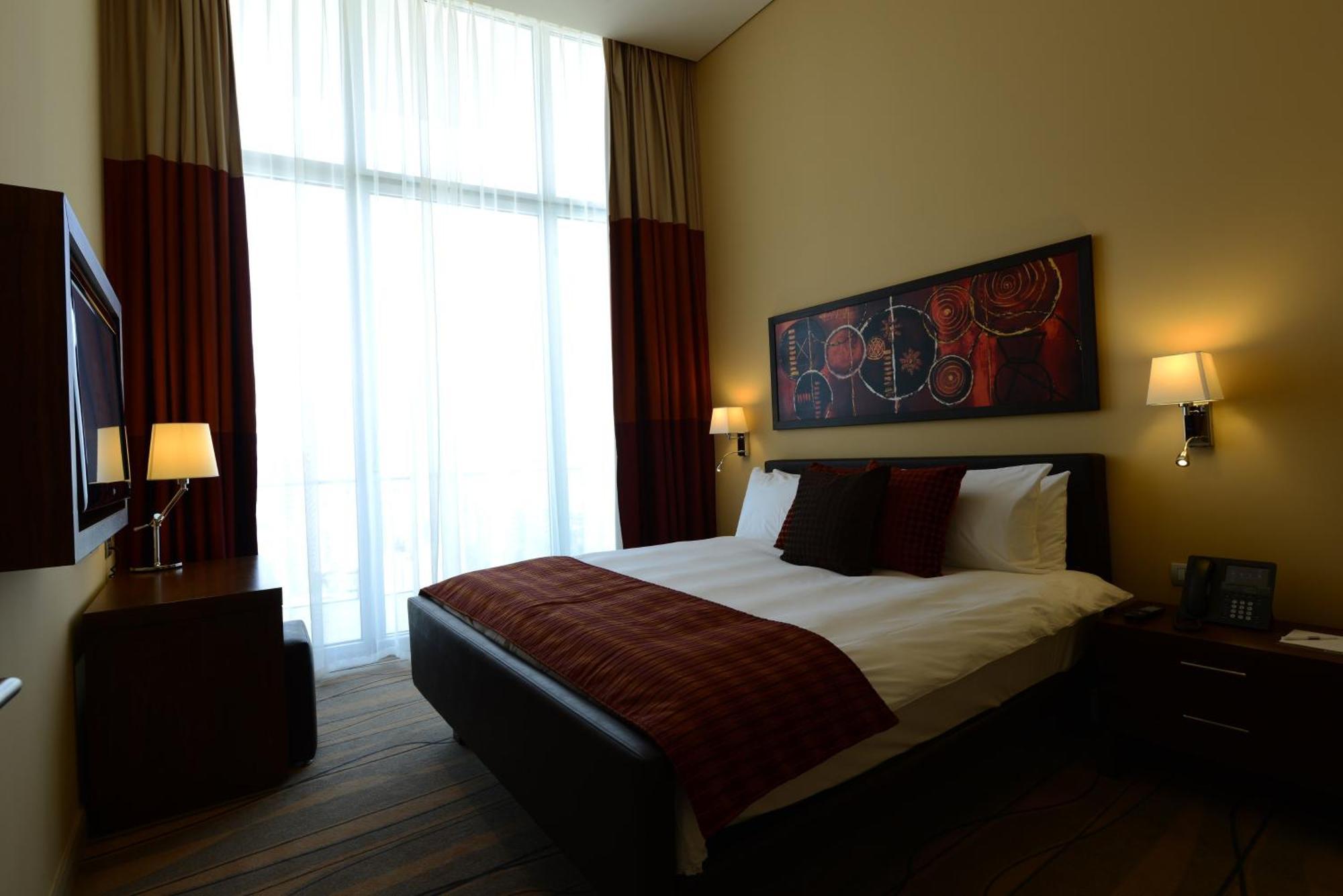 One-Bedroom Suite with Balcony and City View - Non-Smoking