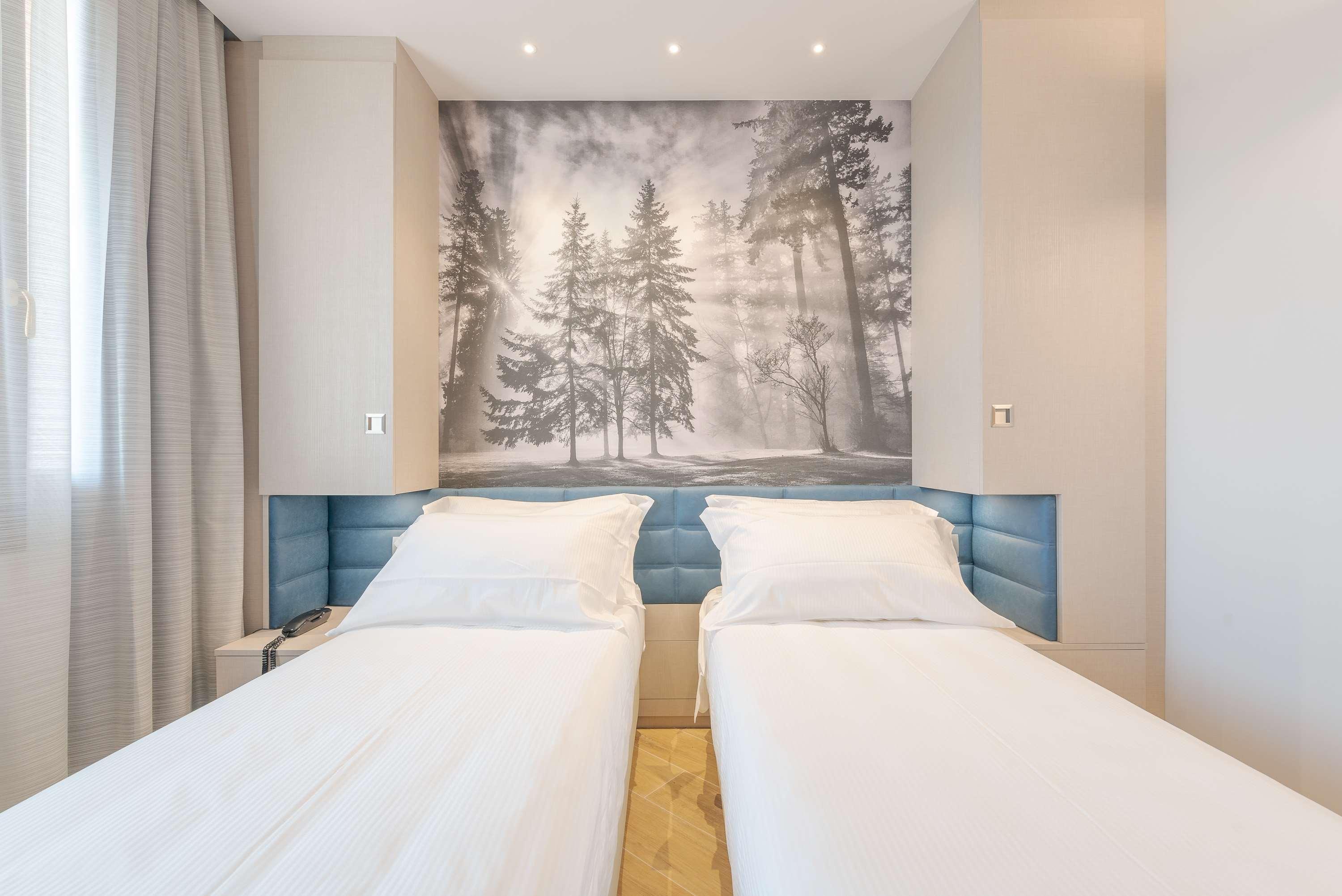 Standard Queen Room Convert Into Two Twin Beds