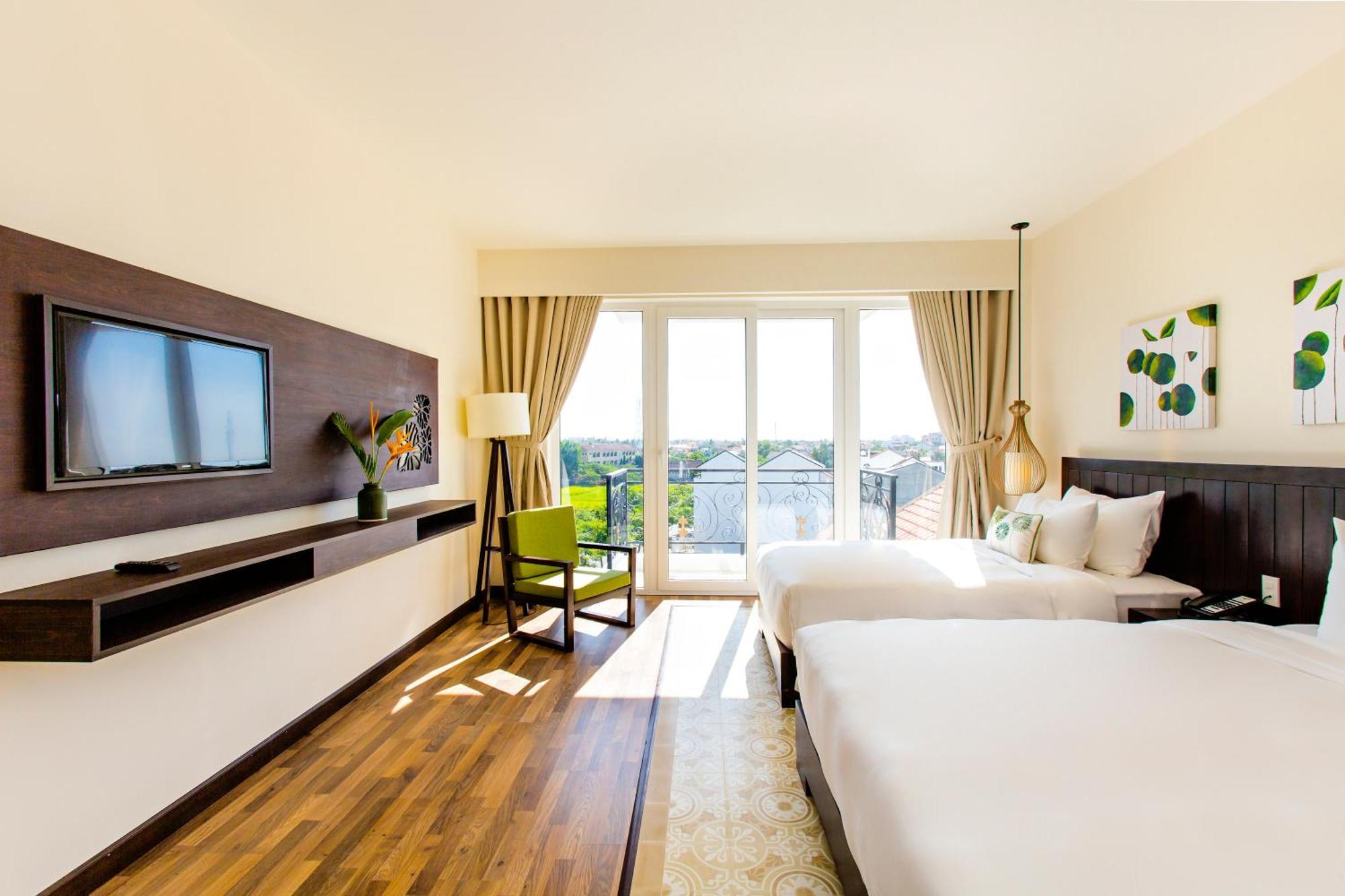 Deluxe Driepersoonskamer met Balkon