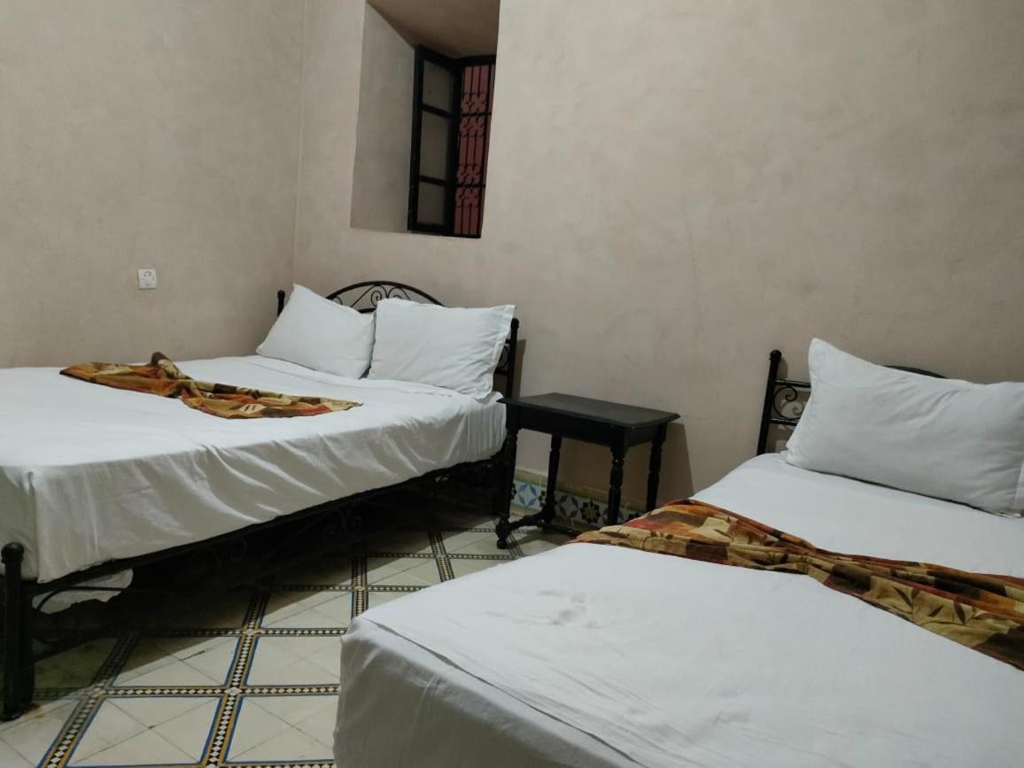 Habitación Triple Básica con baño compartido