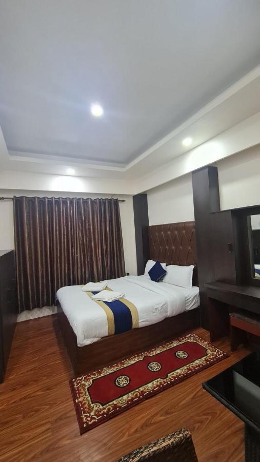 Quarto com Cama Queen-size