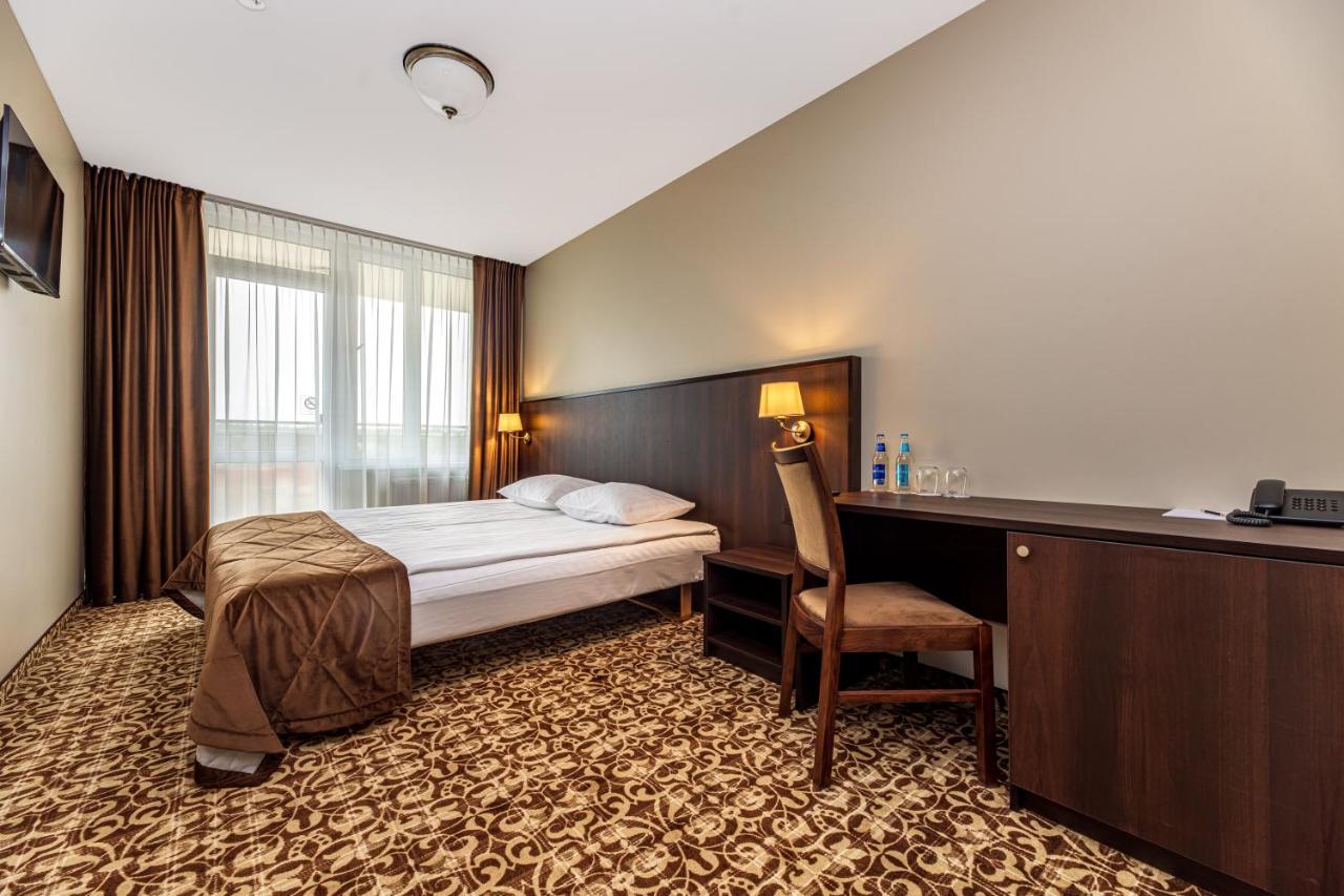 Standard Vierbettzimmer mit Zugang zum Wellnessbereich