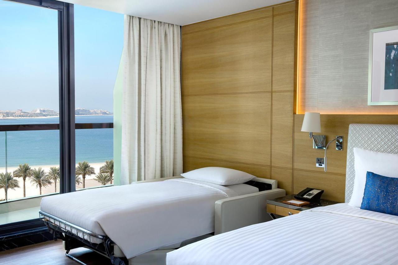 Palm Deluxe Room 1 King Bed Sofa bed Private Balcony Beachfront Resort