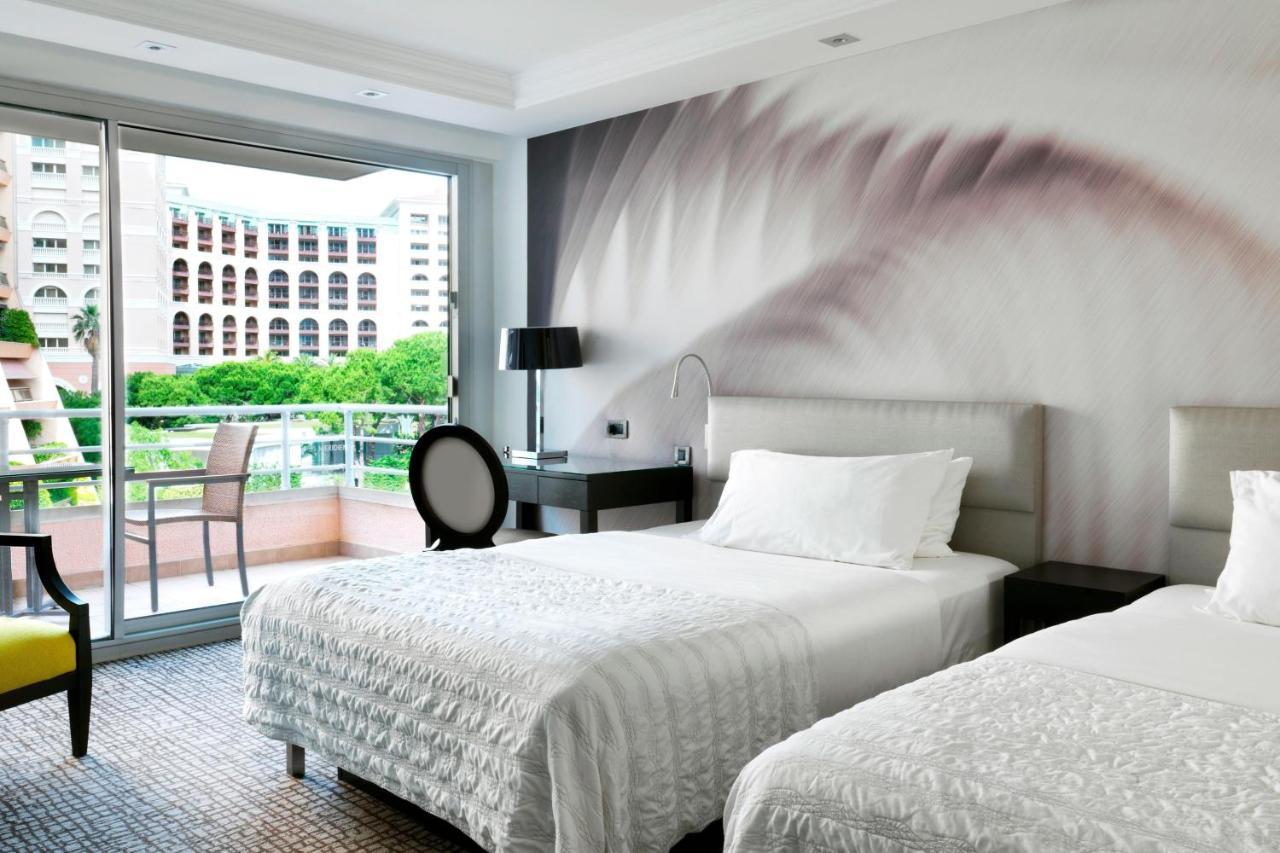 Habitación Clásica con 2 camas dobles y vistas a la ciudad