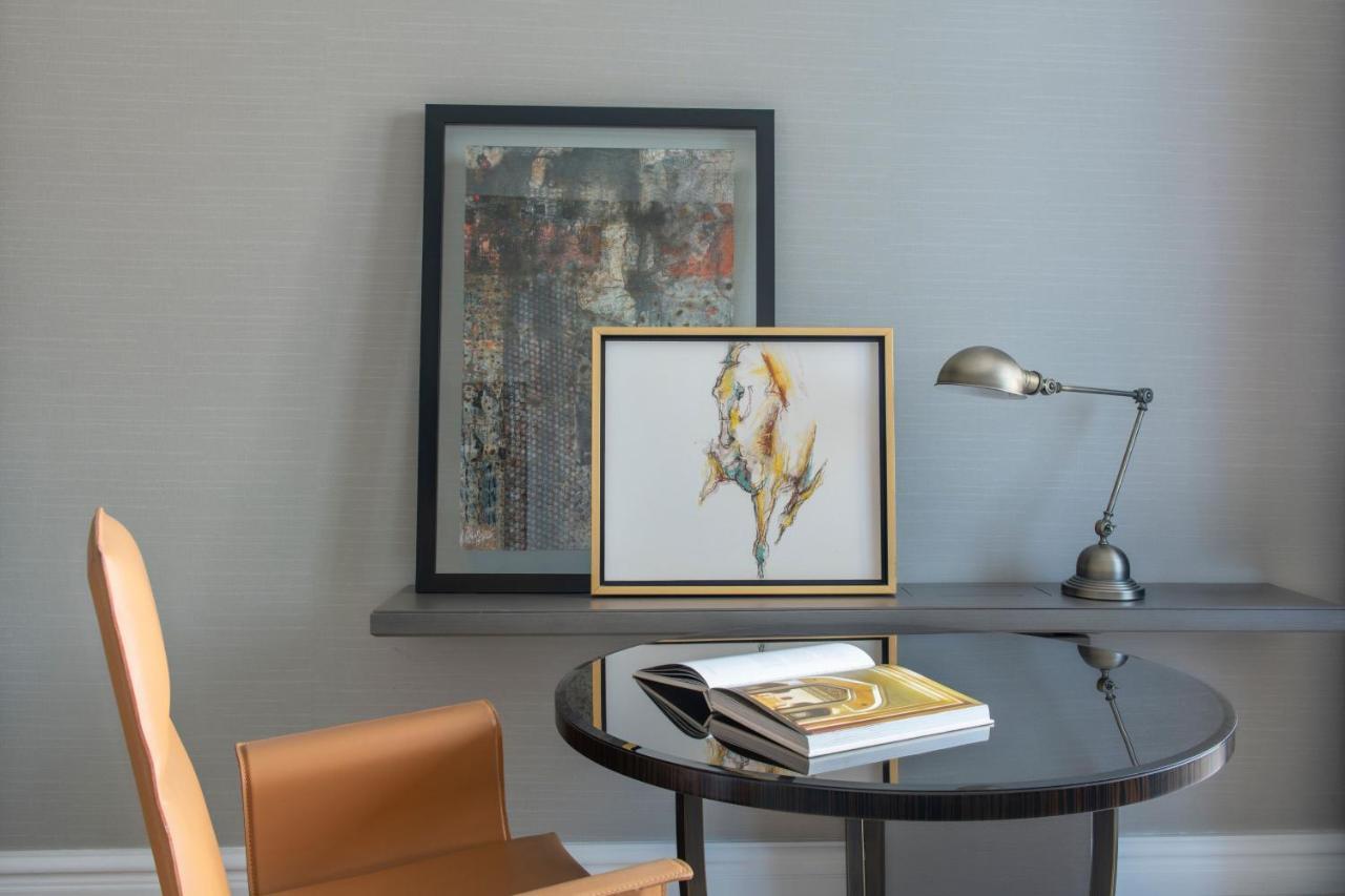 Quarto VIP com cama King-size e Acesso ao Lounge