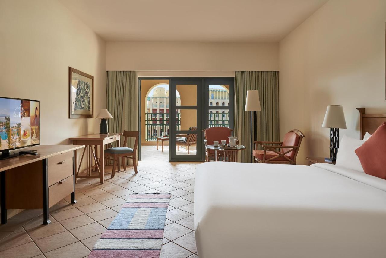 Standard Zimmer mit Kingsize-Bett und Lagunenblick