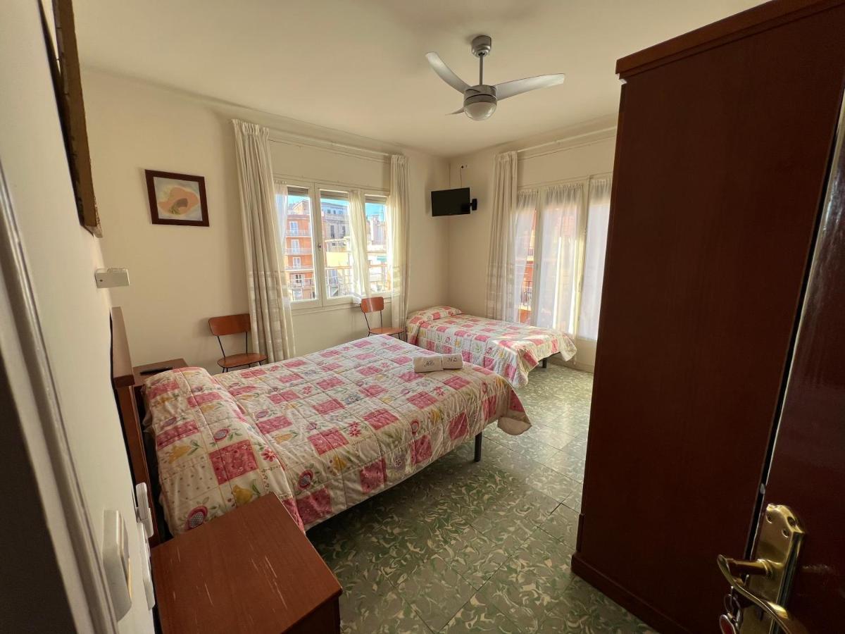 Quarto Triplo com Varanda