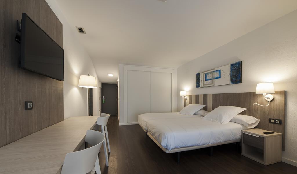 Quarto Triplo (3 Adultos)