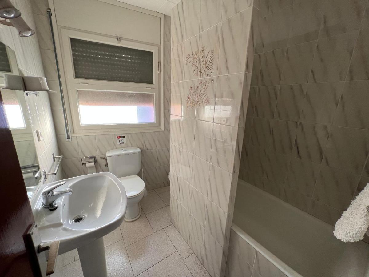 Quarto Quádruplo com Banheiro Compartilhado