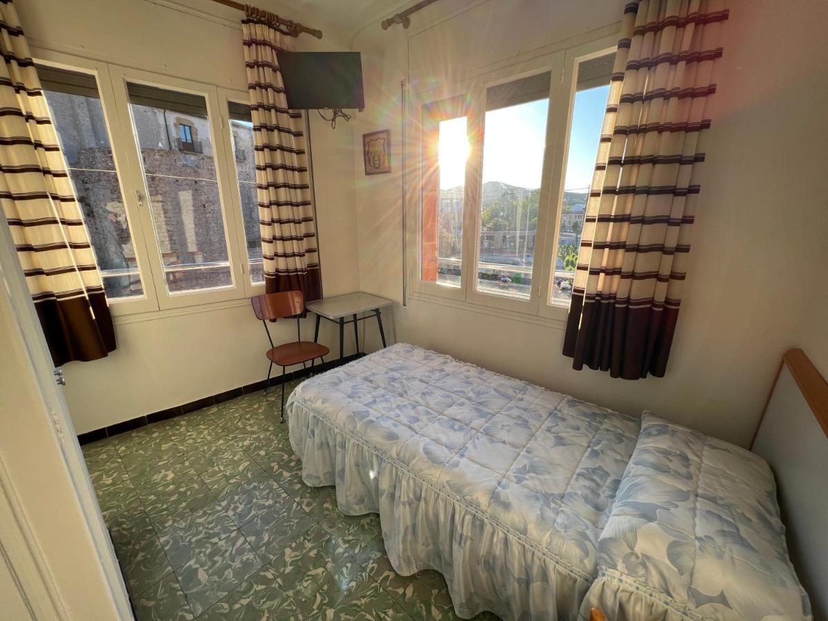 Quarto Individual com Banheiro Compartilhado