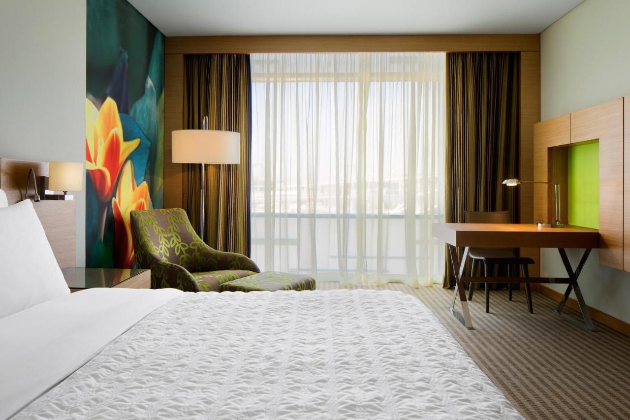 Quarto Deluxe com 1 Cama King-size e Vista Aeroporto