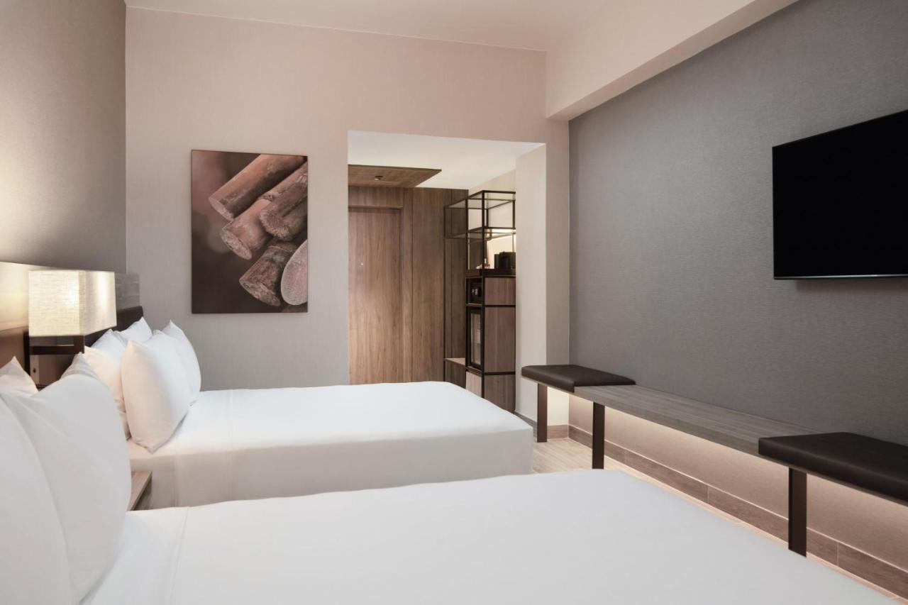 Deluxe Queen Room Two Queen Beds Pool View