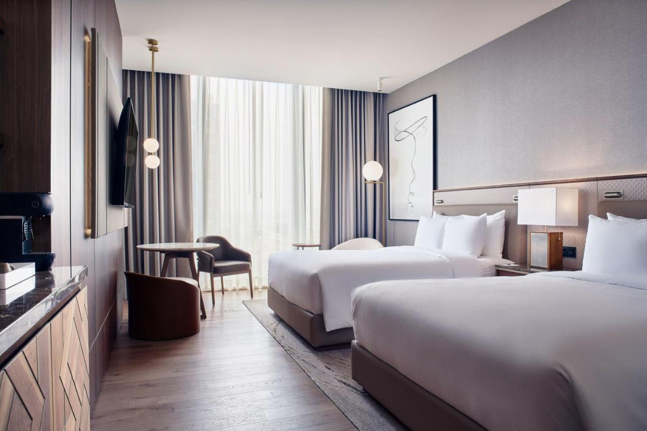 Habitación Deluxe con 2 camas grandes y vistas a la ciudad