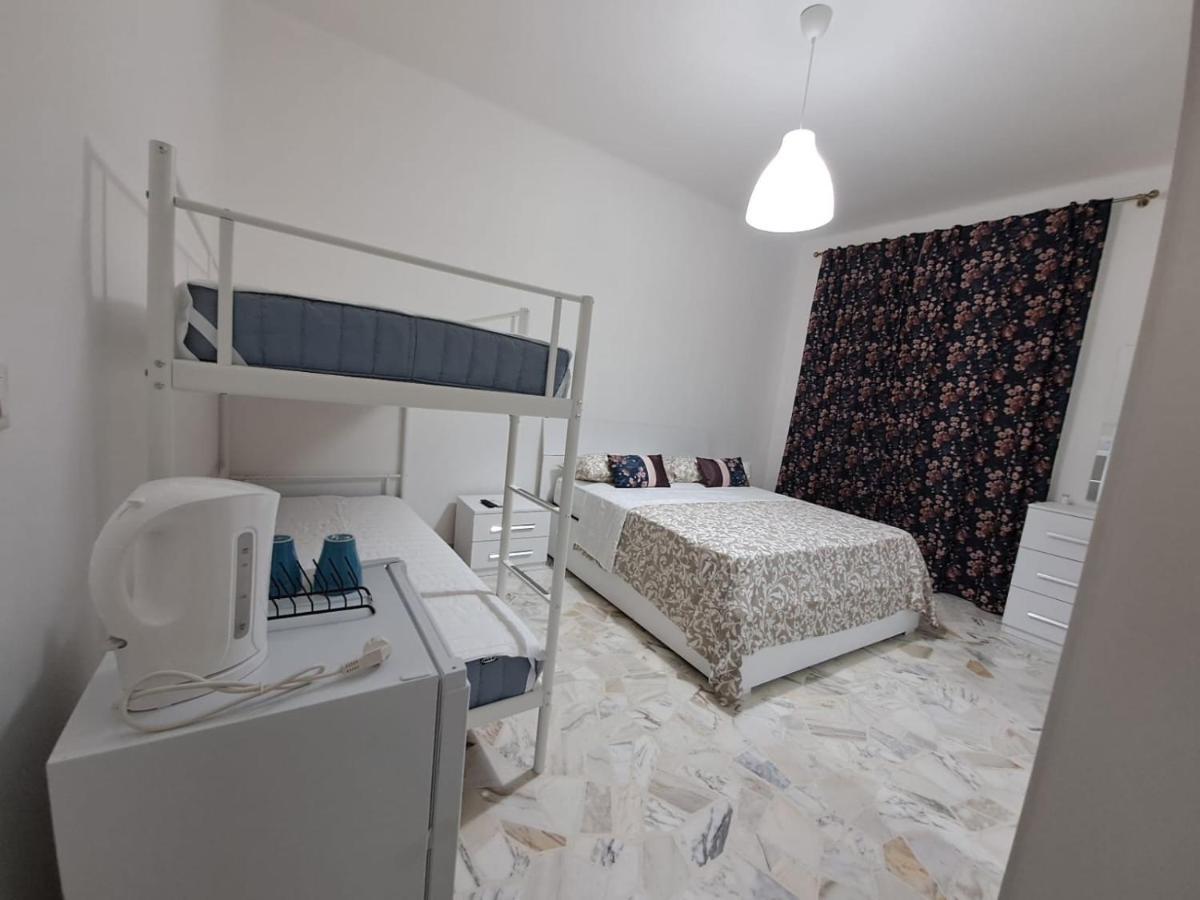 Chambre Quadruple avec Salle de Bains Commune