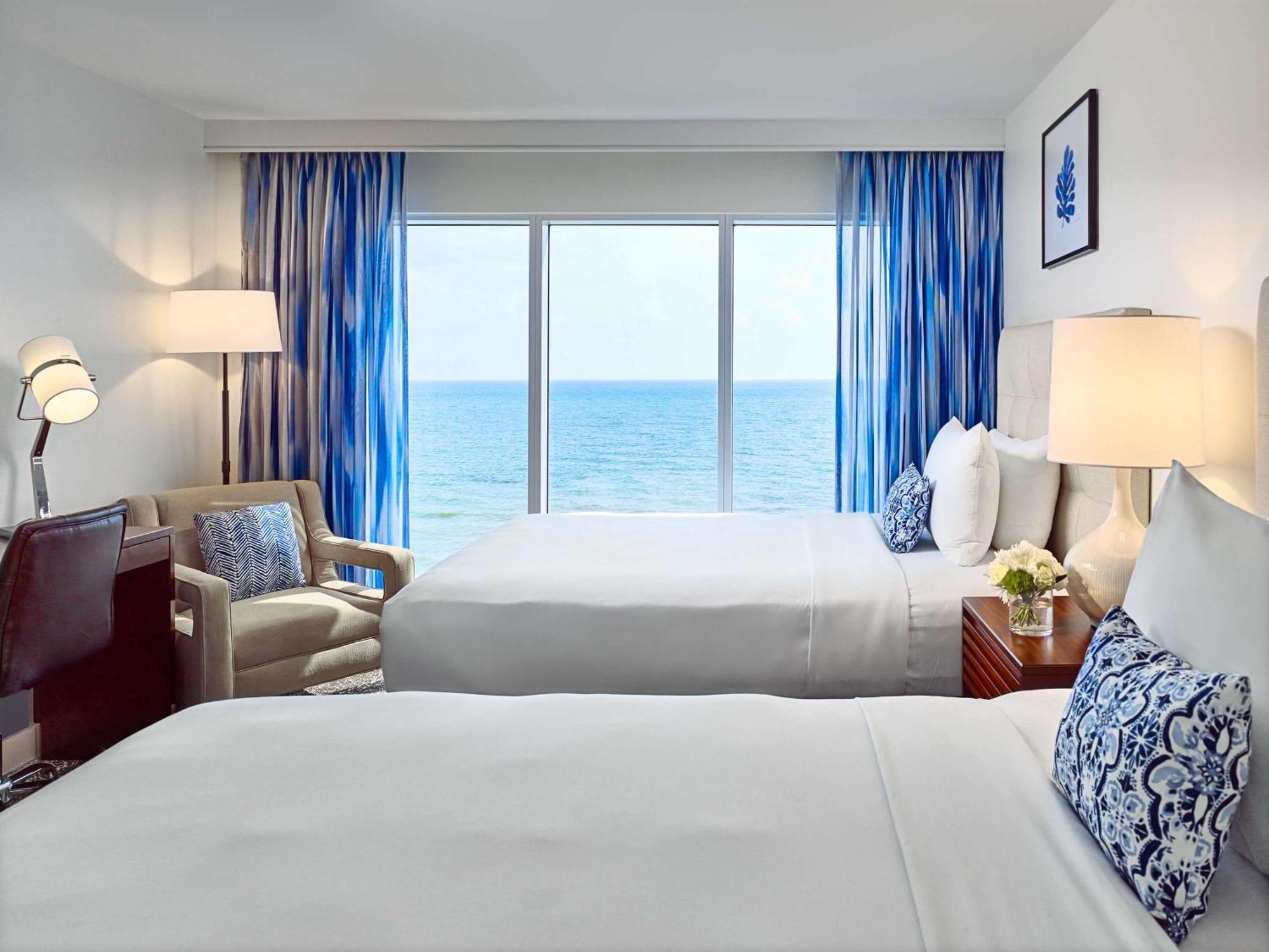 Dois Quartos Duplos Preferred com Vista Oceano