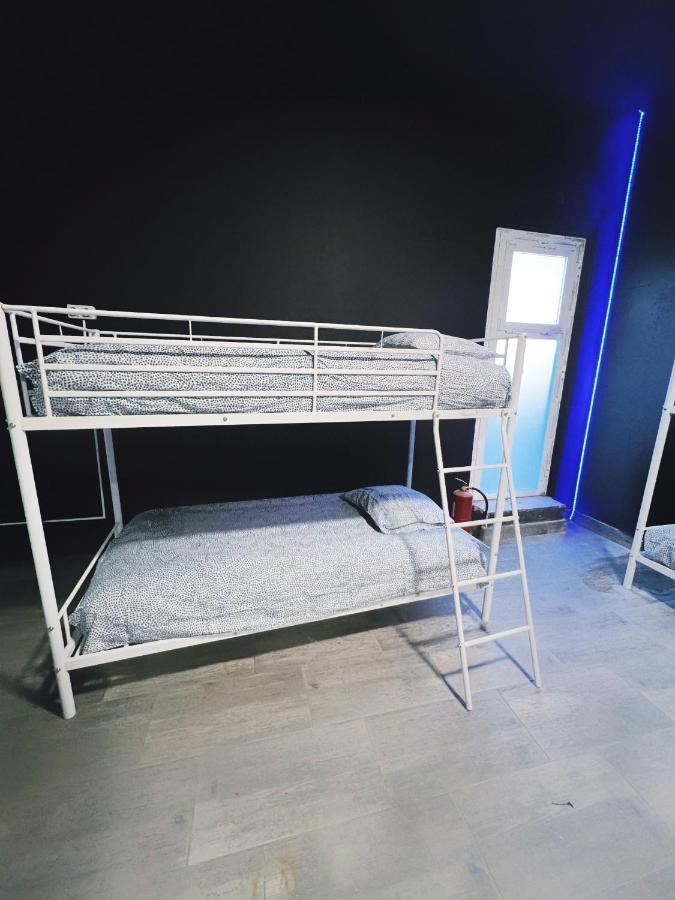 Cama em Beliche num Dormitório Misto