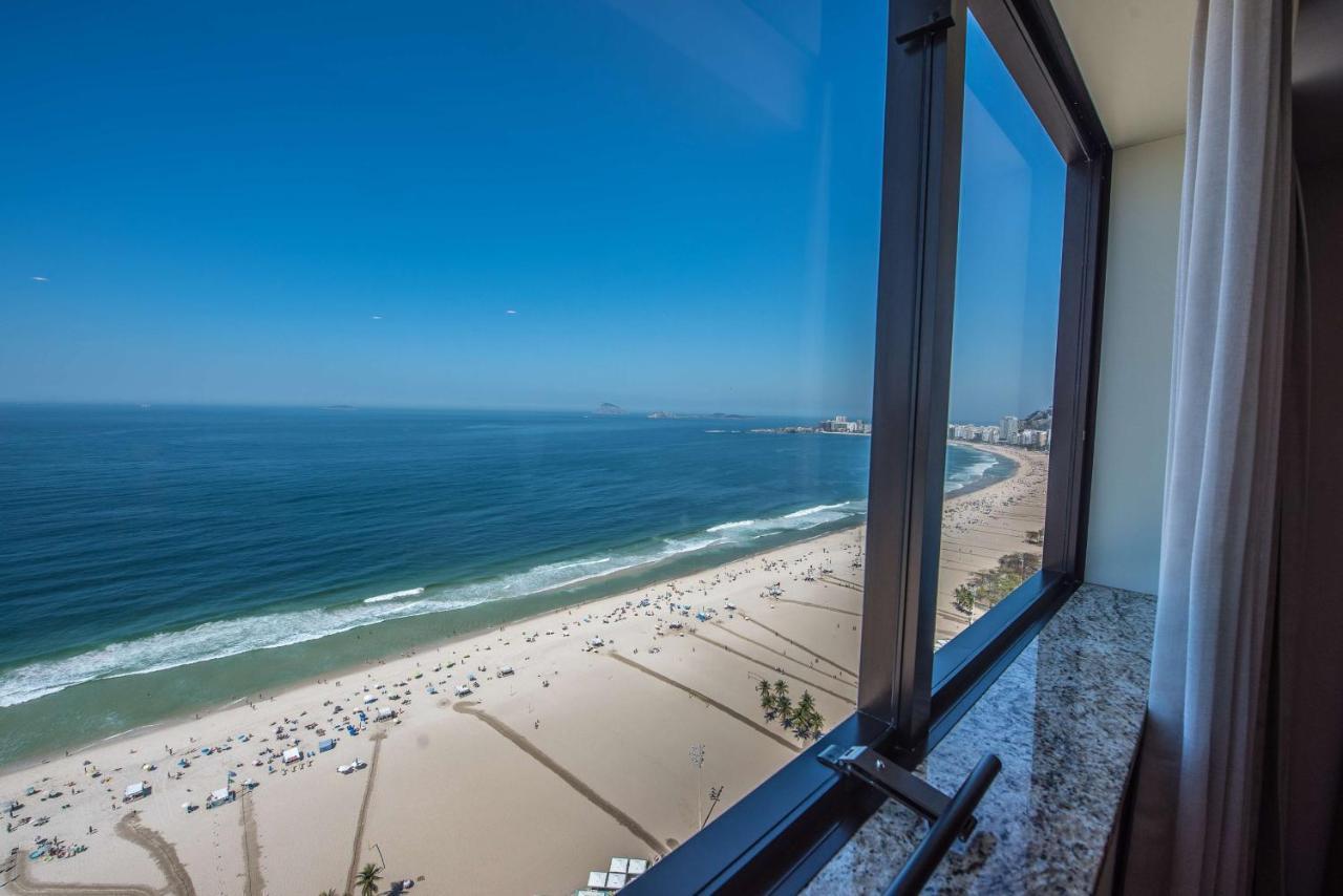 Habitación con cama extragrande y vistas al mar - Frente al mar