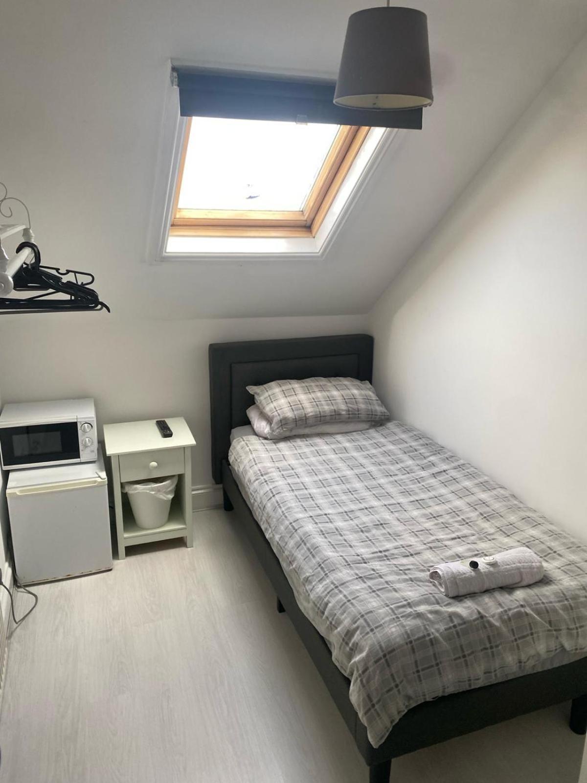 Single Room with Shared Shower and Toilet