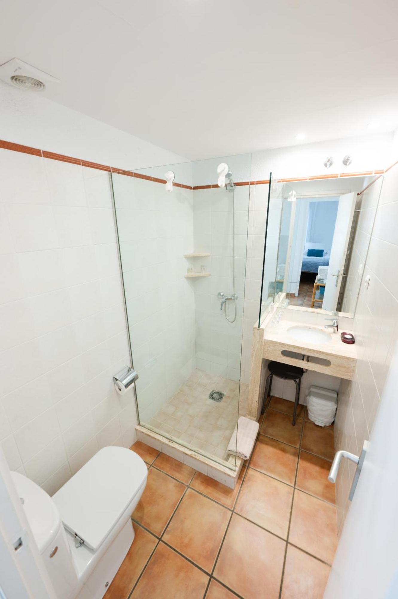 Quadruple Room with Private Bathroom