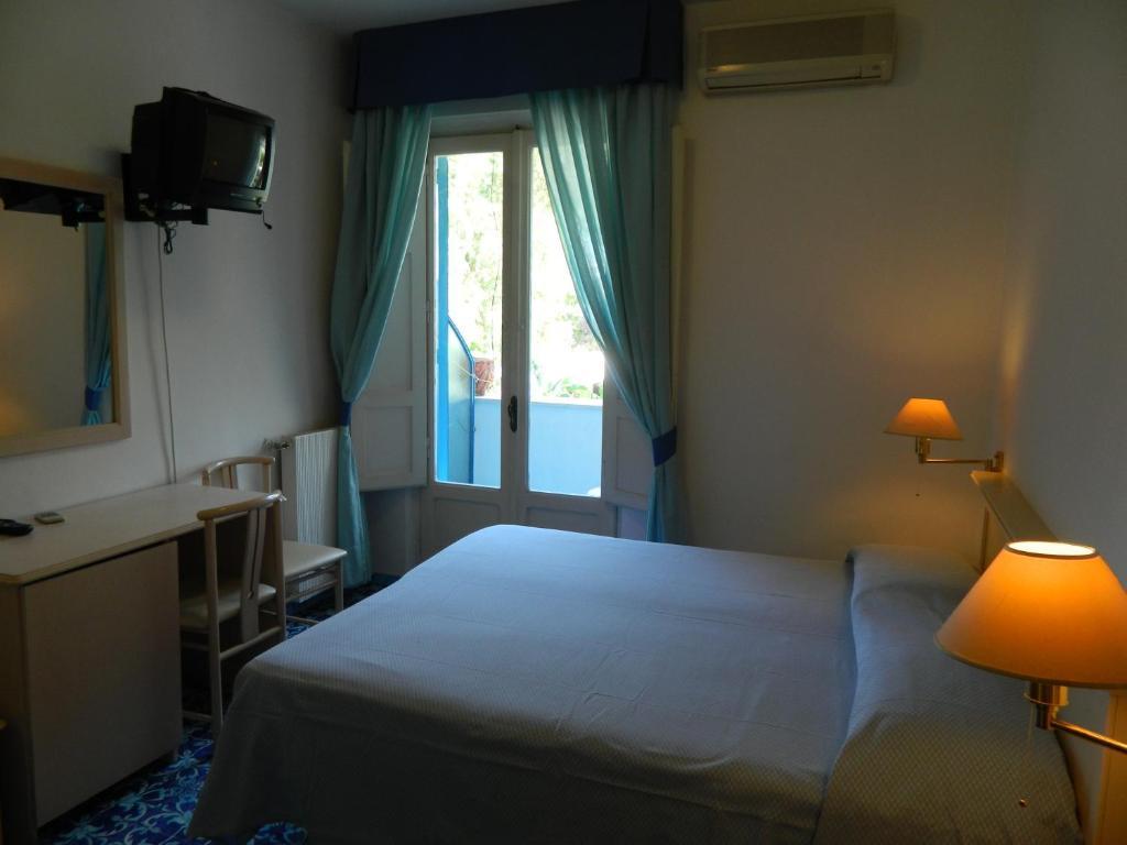 Habitación Cuádruple con balcón
