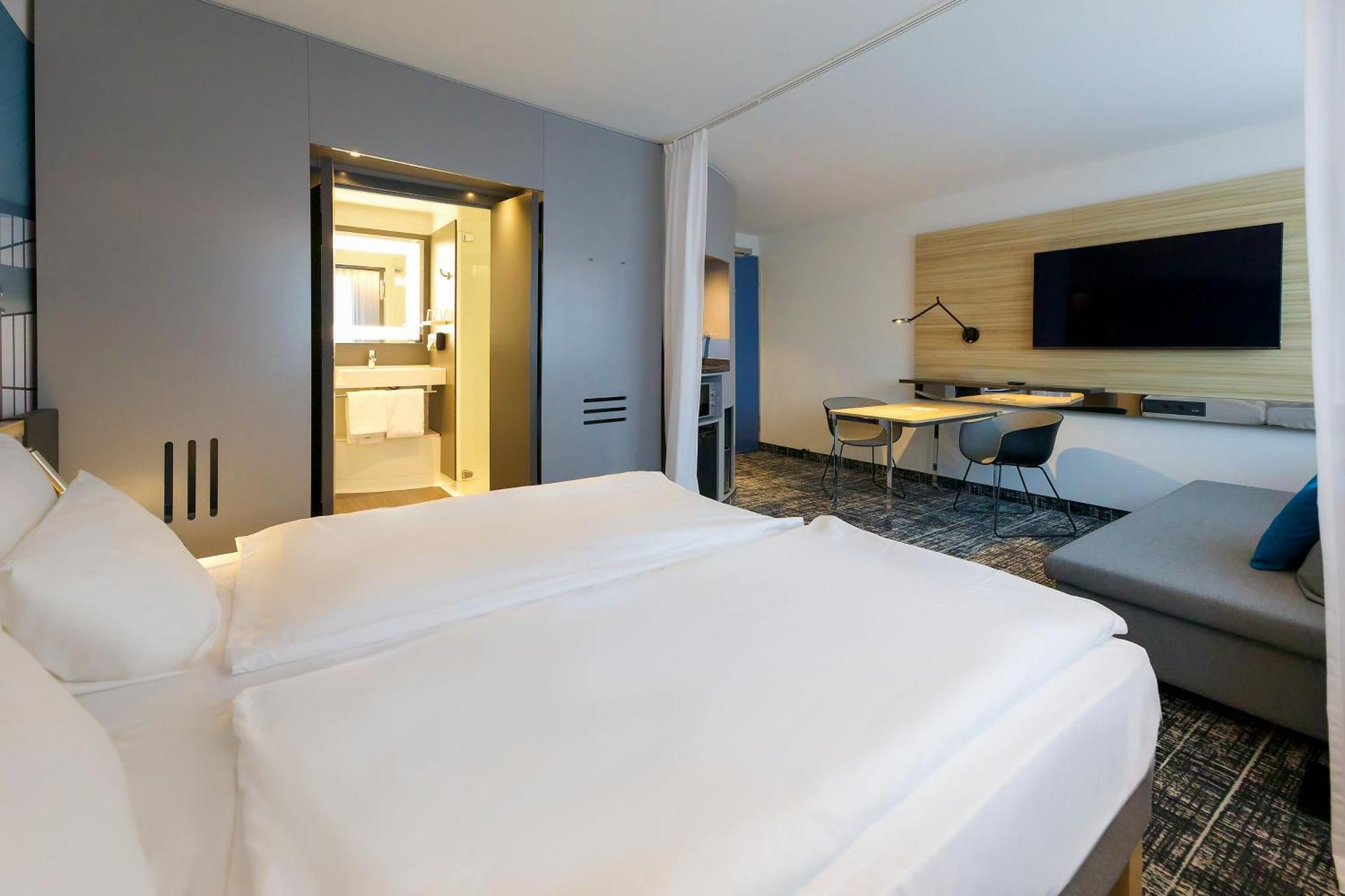 Suíte standard com 2 camas de solteiro e sofá-cama