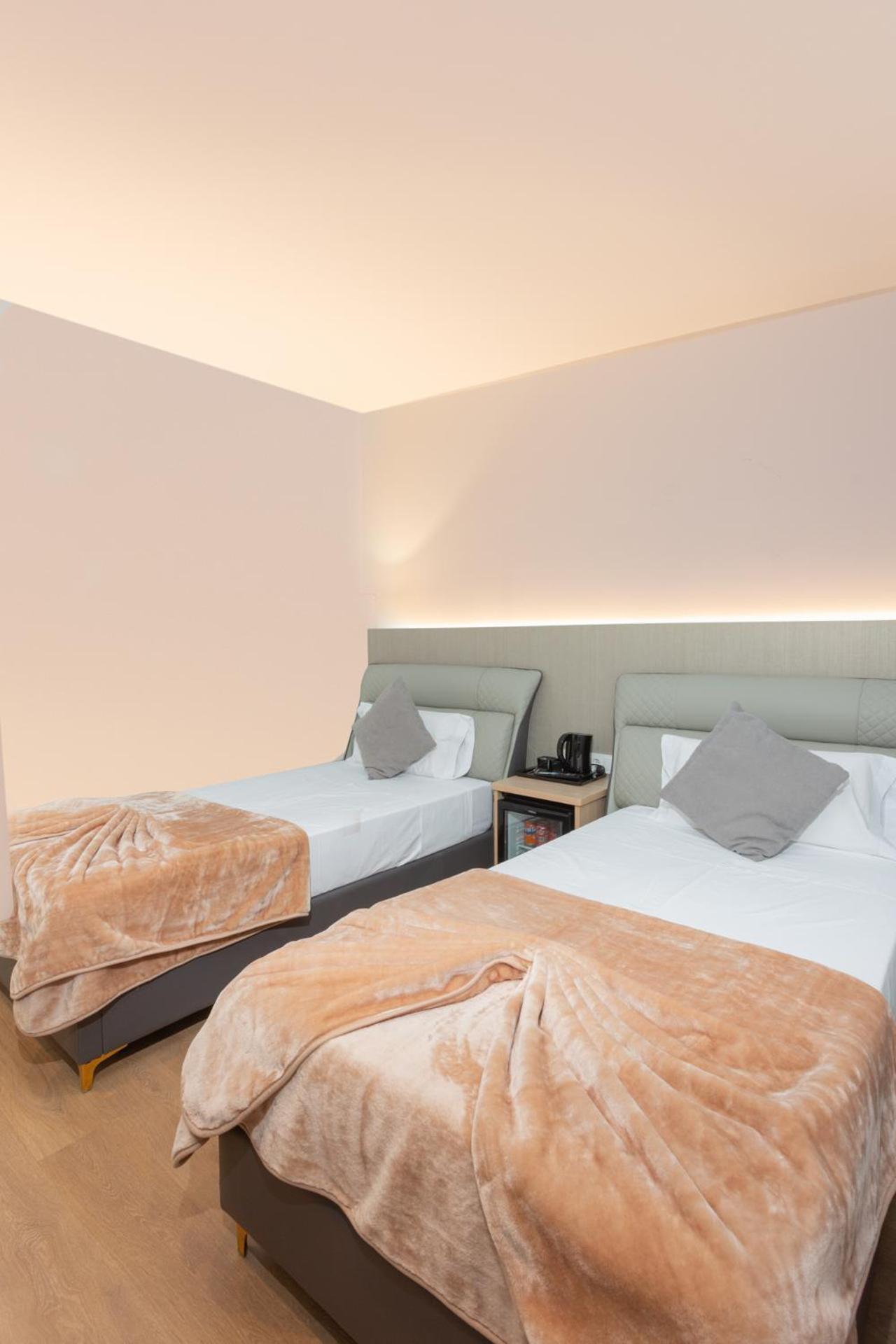Tweepersoonskamer met 2 Aparte Bedden