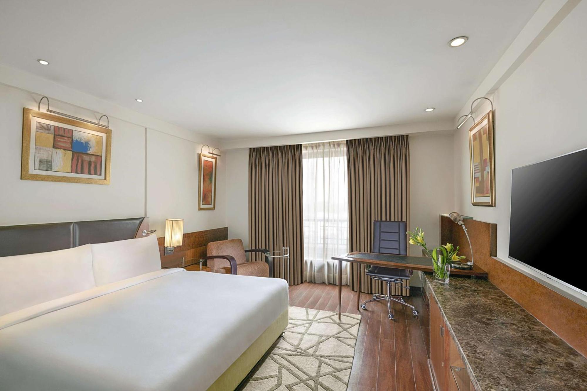 Superior Room with Happy Hours 01:00 PM to 06:00 PM 1+1 ,Free Pick up and drop to Worldmark Aerocity (subject to car availability)