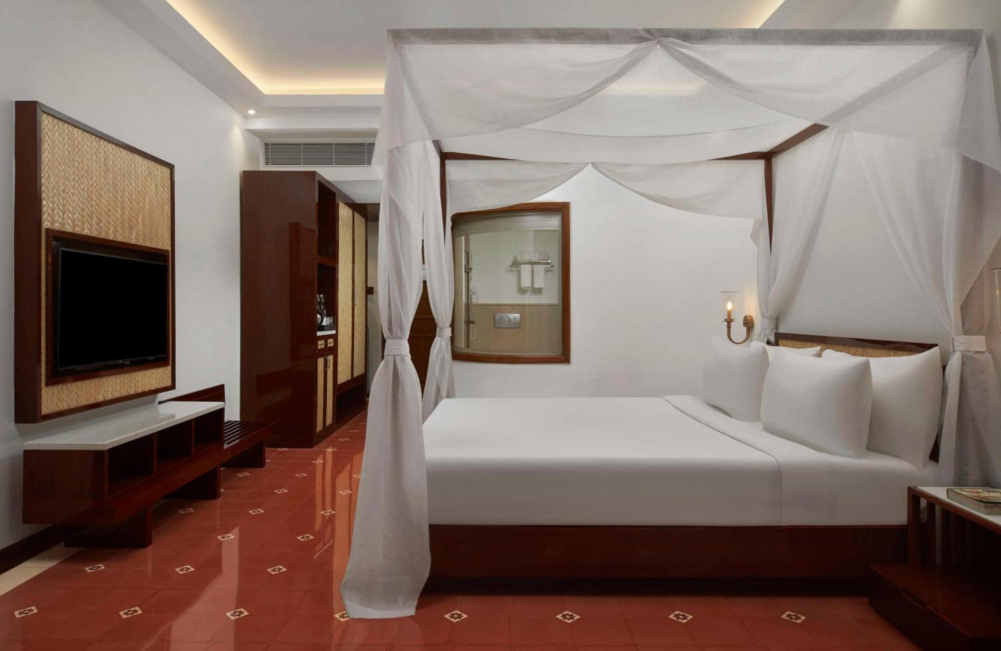 Luxury suite Balcony & Living room of Food & Soft Beverages SPA 1 Goan Bottle INR 500 Hotel Credit spend of INR 5000 Early Check upto 2 hours subject to availability
